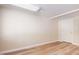Unfinished basement area offering flexible potential with wood-look floors and neutral wall color at 4220 Hope Valley Road Rd, Durham, NC 27707