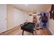 Finished basement with games, featuring wood-look flooring offers great space for recreational activities at 4220 Hope Valley Road Rd, Durham, NC 27707