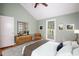 Well-staged bedroom features vaulted ceiling, hardwood floors, and a window for plenty of natural light at 4220 Hope Valley Road Rd, Durham, NC 27707