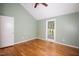 A bedroom is freshly painted and ready for you to decorate with vaulted ceilings and a bright window at 4220 Hope Valley Road Rd, Durham, NC 27707