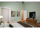 Spacious secondary bedroom is virtually staged to show decorating options at 4220 Hope Valley Road Rd, Durham, NC 27707