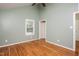 Empty bedroom with vaulted ceiling, light paint and hardwood floors, ready for decorating! at 4220 Hope Valley Road Rd, Durham, NC 27707