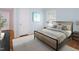 Staged bedroom featuring a bed with stylish decor and a serene ambiance at 4220 Hope Valley Road Rd, Durham, NC 27707