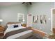 Decorated secondary bedroom showing decorating possibilities. Hardwood floors and vaulted ceilings at 4220 Hope Valley Road Rd, Durham, NC 27707