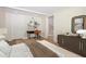 Staged bedroom featuring a comfortable bed, desk, and stylish decor for a productive space at 4220 Hope Valley Road Rd, Durham, NC 27707