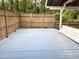 Spacious outdoor deck features a beautiful lattice fence and natural views at 4220 Hope Valley Road Rd, Durham, NC 27707