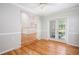 Bright dining area with hardwood floors and french doors leading to the outside at 4220 Hope Valley Road Rd, Durham, NC 27707