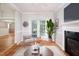 Dining area with hardwood floors, fireplace, and french doors for ample natural light at 4220 Hope Valley Road Rd, Durham, NC 27707
