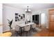 Elegantly staged dining room with marble table and modern decor at 4220 Hope Valley Road Rd, Durham, NC 27707