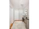 Upstairs hallway virtually staged to show decorating possibilities at 4220 Hope Valley Road Rd, Durham, NC 27707