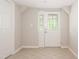 Well-lit entryway features tiled floors and a decorative glass door at 4220 Hope Valley Road Rd, Durham, NC 27707