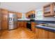 Spacious kitchen with stainless steel appliances and light wood cabinetry at 4220 Hope Valley Road Rd, Durham, NC 27707