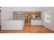 Bright kitchen boasts stainless steel appliances and wood cabinets, creating an inviting space at 4220 Hope Valley Road Rd, Durham, NC 27707