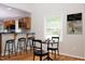 Kitchenette with seating and natural light at 4220 Hope Valley Road Rd, Durham, NC 27707