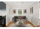 Well-decorated room featuring a sofa, fireplace, stylish decorations, and ample natural light at 4220 Hope Valley Road Rd, Durham, NC 27707