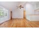 Spacious living room with vaulted ceilings, hardwood floors, and abundant natural light at 4220 Hope Valley Road Rd, Durham, NC 27707