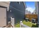 Backyard space with artificial turf and two air conditioning units at 450 Granite Mill Blvd, Chapel Hill, NC 27516