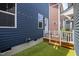 Backyard area with artificial turf and wood deck at 450 Granite Mill Blvd, Chapel Hill, NC 27516