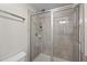 Bathroom featuring tiled shower stall with clear glass doors and modern fixtures at 450 Granite Mill Blvd, Chapel Hill, NC 27516