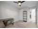 Bedroom featuring a ceiling fan, carpet, a desk, and storage at 450 Granite Mill Blvd, Chapel Hill, NC 27516