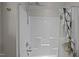 Bright white shower with a leafy shower curtain and a chrome shower head and faucet at 450 Granite Mill Blvd, Chapel Hill, NC 27516