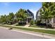 A row of charming homes with well-manicured lawns and beautiful landscaping on a sunny day at 450 Granite Mill Blvd, Chapel Hill, NC 27516