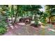 A backyard featuring trees, a white house, and a gazebo at 4509 Stevens Chapel Rd, Smithfield, NC 27577