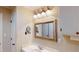 Bathroom showcasing a vanity, sink, lighting fixtures, and cabinet space for a stylish and organized space at 4509 Stevens Chapel Rd, Smithfield, NC 27577