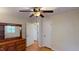 Bedroom with hardwood floors, ceiling fan, and dresser at 4509 Stevens Chapel Rd, Smithfield, NC 27577
