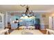 Open concept kitchen, featuring granite countertops, stainless steel appliances, and a breakfast bar at 4509 Stevens Chapel Rd, Smithfield, NC 27577