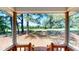 Porch with wooden stairs and a view of the trees at 4509 Stevens Chapel Rd, Smithfield, NC 27577