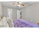 Bright bedroom with hardwood floors and view to kitchen and bathroom at 501 Gooseneck Dr # B2, Cary, NC 27513