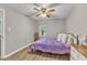 Well-lit bedroom offers hardwood floors, neutral paint, and a cozy atmosphere at 501 Gooseneck Dr # B2, Cary, NC 27513