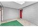 Enclosed entrance way with red door and horizontal siding at 501 Gooseneck Dr # B2, Cary, NC 27513
