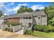 Inviting condo with a covered porch, walkway, and well-maintained landscaping on a sunny day at 501 Gooseneck Dr # B2, Cary, NC 27513