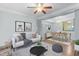 Stylized living room and dining room combo with modern furniture and decor at 510 Berry Chase Way, Cary, NC 27519