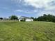 One-story home with driveway and expansive lawn at 5219 Merlin Dr, Snow Camp, NC 27349