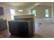 Bright living room featuring plush carpeting with an open floorplan and vaulted ceiling at 5219 Merlin Dr, Snow Camp, NC 27349
