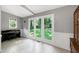Bonus room with bright light from large windows and views of the green backyard at 5304 W Oaks Dr, Fuquay Varina, NC 27526