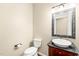 Powder room featuring an ornate mirror and a vessel sink at 5520 Creek Pine Dr, Wake Forest, NC 27587