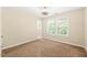 Bedroom with carpet flooring, window and ceiling fan at 5520 Creek Pine Dr, Wake Forest, NC 27587