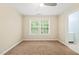 Bedroom with carpet flooring, window and ceiling fan at 5520 Creek Pine Dr, Wake Forest, NC 27587