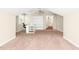 Spacious bonus room with office space, built in shelving, plush carpet, and neutral paint at 5520 Creek Pine Dr, Wake Forest, NC 27587