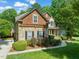 Attractive two-story home featuring a stone facade and an attached garage at 5520 Creek Pine Dr, Wake Forest, NC 27587