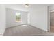 Bedroom with neutral carpet, and a sunlit window, creating an inviting space at 56 Mable Court # 20, Lillington, NC 27546