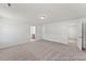 Spacious bedroom with neutral carpet and multiple doorways, enhancing flow at 56 Mable Court # 20, Lillington, NC 27546