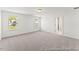 Spacious bedroom with neutral carpet, and bright windows, offering natural light at 56 Mable Court # 20, Lillington, NC 27546