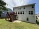 Two-story home featuring a wood deck and a spacious backyard at 5804 Claribel Ct, Raleigh, NC 27612