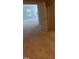View of carpeted bedroom with natural light from the windows at 5804 Claribel Ct, Raleigh, NC 27612