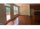 Breakfast nook features wood floors, lots of light, and access to a deck at 5804 Claribel Ct, Raleigh, NC 27612